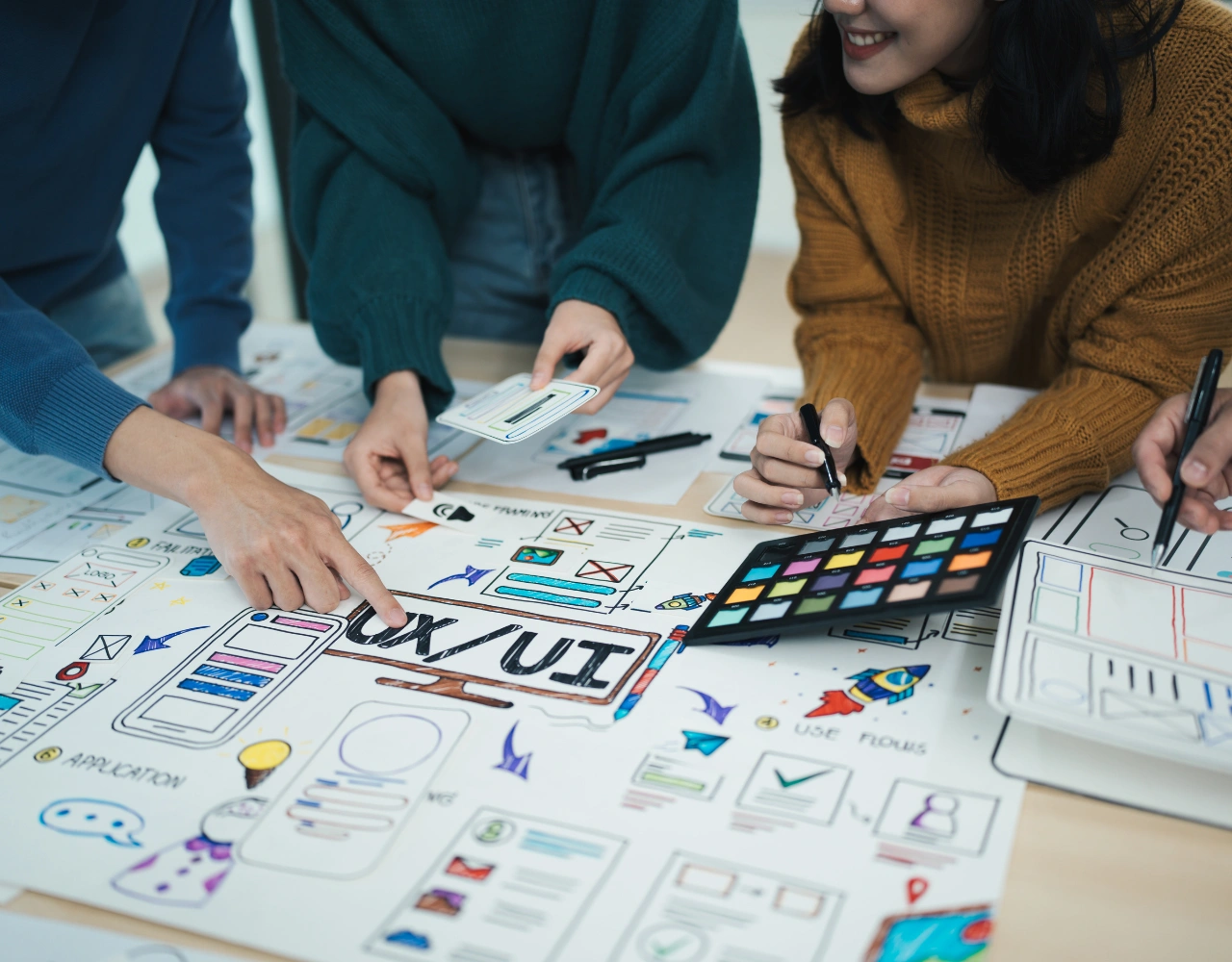 Social media team planning and organizing branded content for consistent online publishing